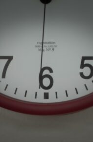 a close up of a clock face showing the time